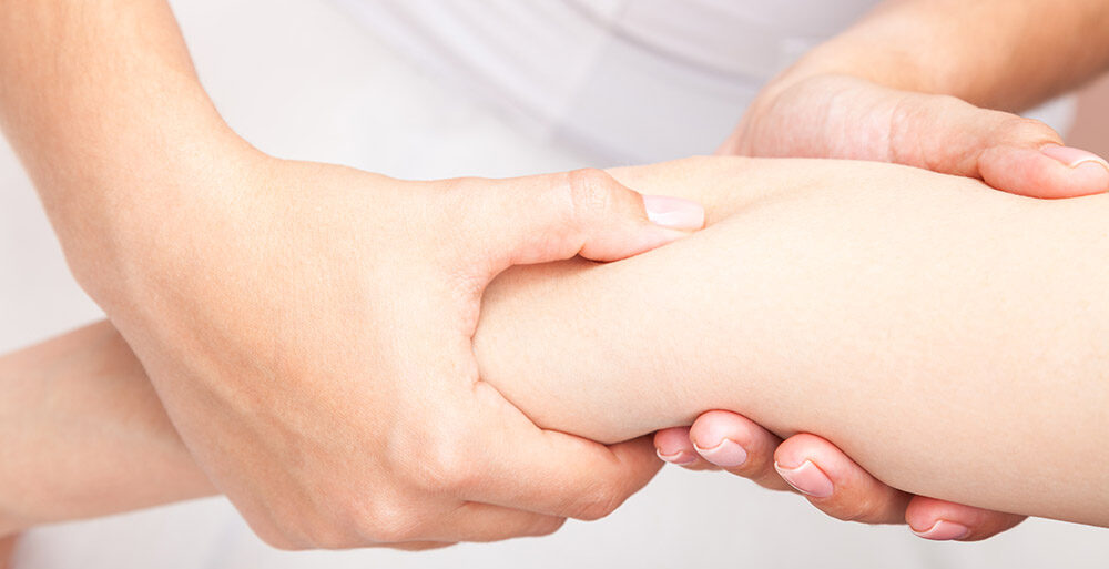 woman receiving massage elbow visible